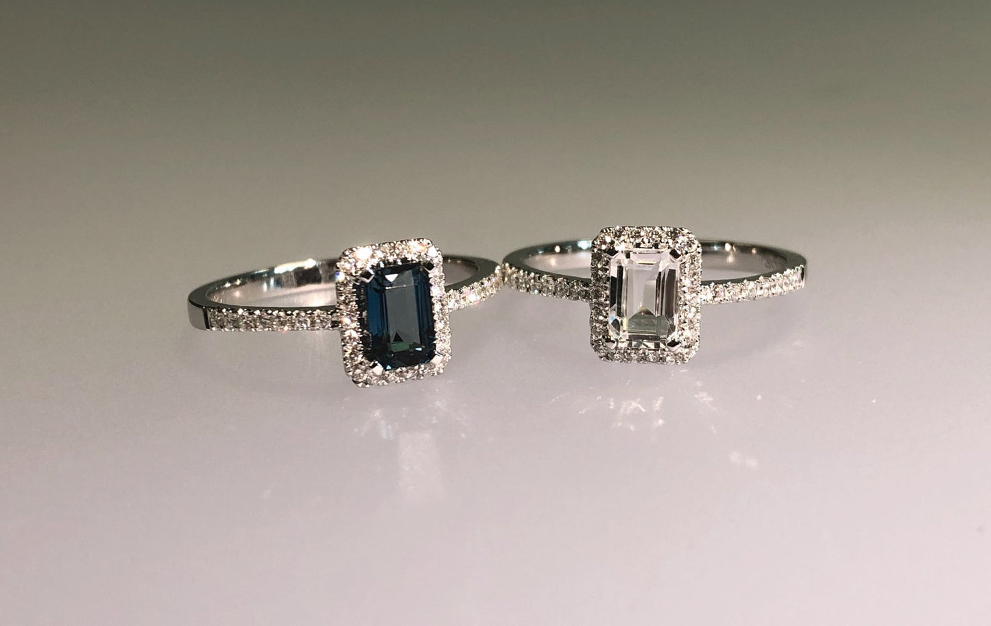 Galant diamantring i hvitt 585 gull W/SI totalt 0,18 ct. med baguetteslipt London blue topas 0,70 ct