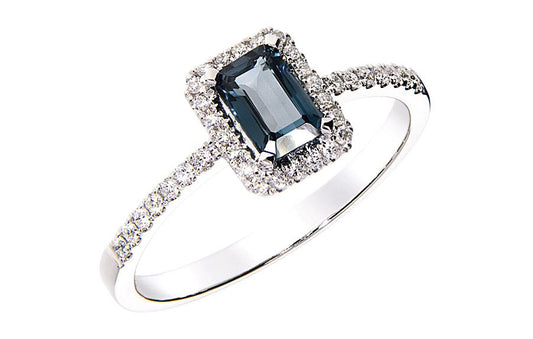 Galant diamantring i hvitt 585 gull W/SI totalt 0,18 ct. med baguetteslipt London blue topas 0,70 ct